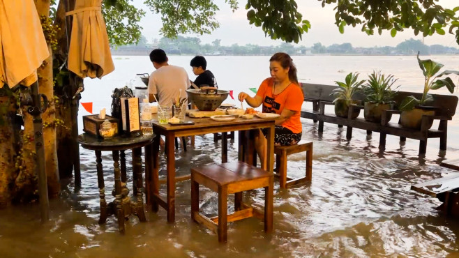 Flood turns riverside Thai restaurant into unlikely bustling attraction
