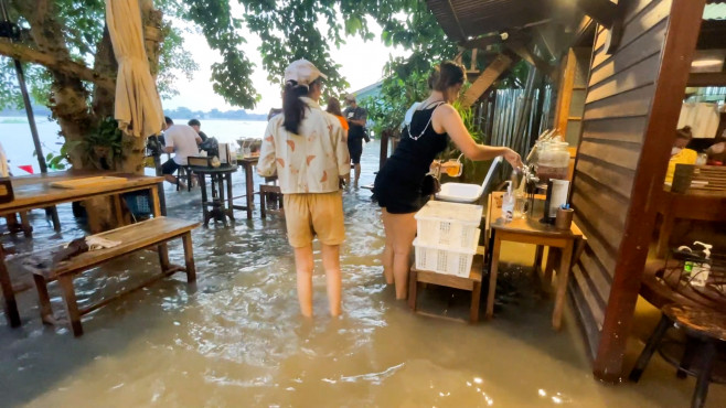 Flood turns riverside Thai restaurant into unlikely bustling attraction