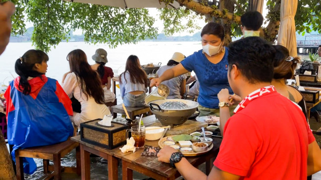 Flood turns riverside Thai restaurant into unlikely bustling attraction