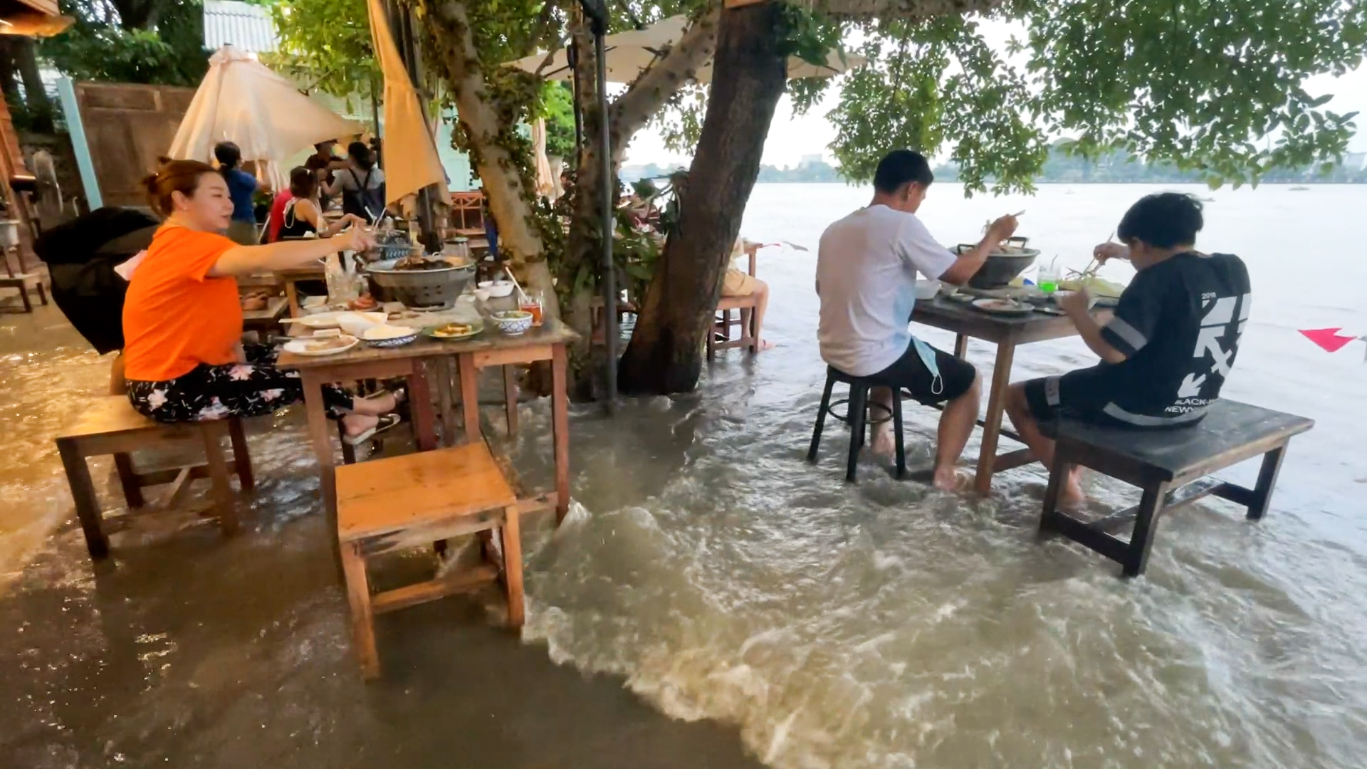 Flood turns riverside Thai restaurant into unlikely bustling attraction