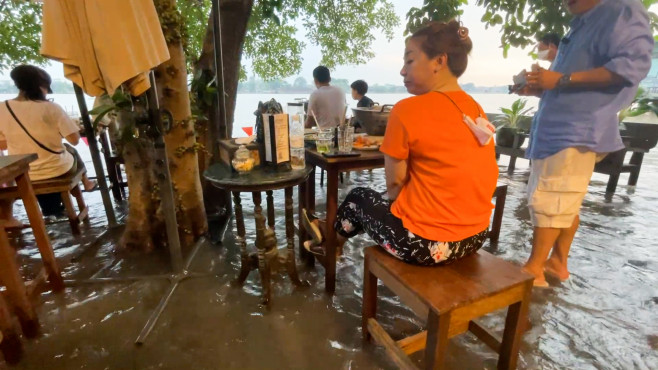 Flood turns riverside Thai restaurant into unlikely bustling attraction