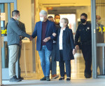Back on his feet! Former President Bill Clinton looks in good spirits as he leaves the hospital in California.