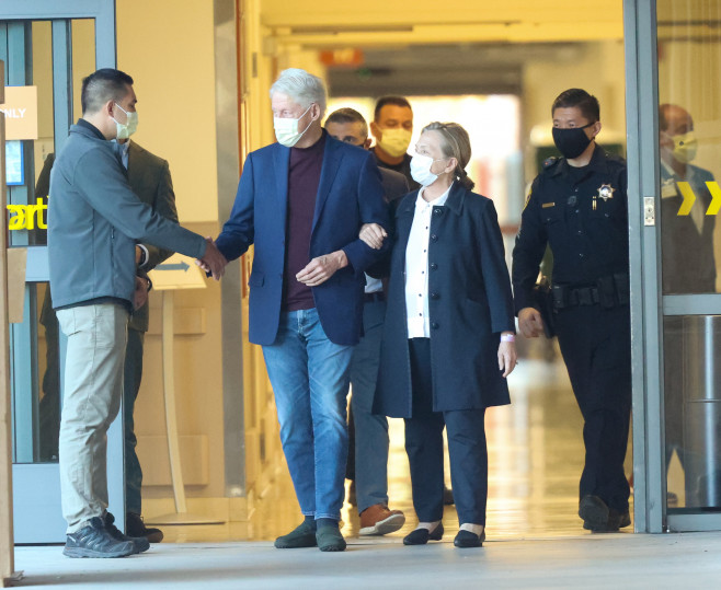 Back on his feet! Former President Bill Clinton looks in good spirits as he leaves the hospital in California.