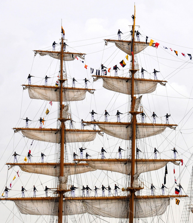 Ecuadorian sailors of the Ecuadorian tall ship BAE Guayas man the yardarms as they arrive in New Orleans for the War of 1812 Bicentennial Commemoration April 17, 2012 in New Orleans, LA. The events are part of a series of city visits by the Navy, Coast Gu