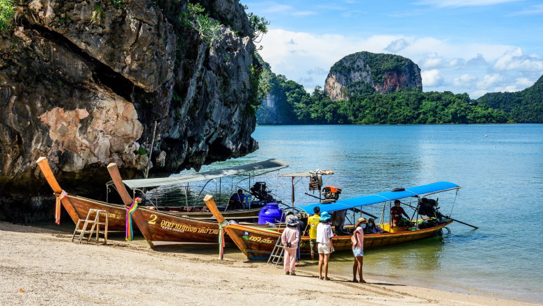 A picture taken on October 30, 2021 shows tourists arriving at James Bond Island in Phang Nga Bay northeast of Phuket on October 30, 2021