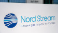 08 March 2022, Mecklenburg-Western Pomerania, Lubmin: A sign with the words "Nord Stream" stands in front of the gas receiving station of the Nord Stream 1 Baltic Sea pipeline and the transfer station of the OPAL long-distance gas pipeline (Ostsee-Pipelin