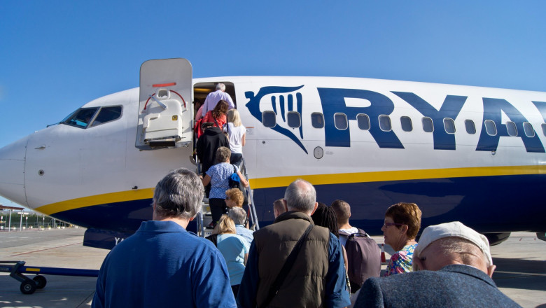 Passenger boarding a Ryanair plane in Murcia airport Spain