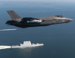 F-35 Lightning II Aircraft Flies over USN USS Zumwalt