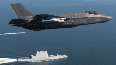 F-35 Lightning II Aircraft Flies over USN USS Zumwalt
