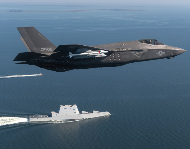 F-35 Lightning II Aircraft Flies over USN USS Zumwalt