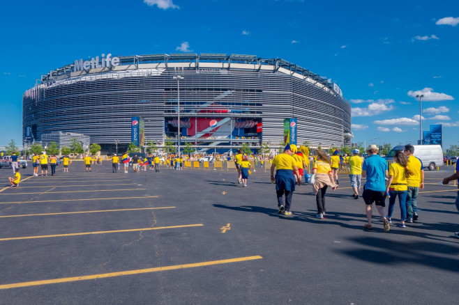 NEW YORK, USA - NOVEMBER 22, 2016: Unidentified ecuadorian fans walking to enter to Metlife Stadium to see the football game in New York Usa