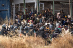 Mii de migranți au luat cu asalt intrarea în enclava spaniolă Melilla din Maroc
