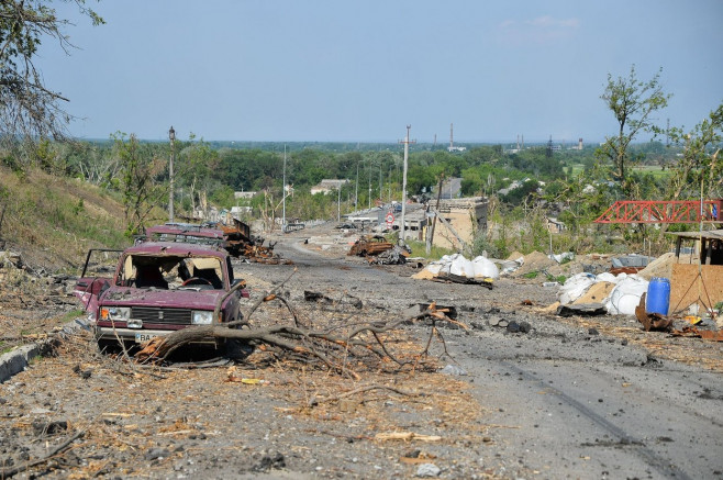 Lysychansk, Ukraine. 19th June, 2022. The bridge from Lysychansk to Severodonetsk is nearly completely destroyed by the war between the Russians and Ukrainian forces. After nearly 5 months of fighting, a continued Russian bombardment has nearly cut off co