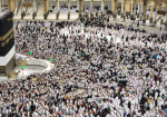 Muslim pilgrims perform prayer and Tawaf around the Kaaba, Islam's holiest shrine, at the Grand mosque in the holy Saudi city of Mecca, during annual Hajj pilgrimage
