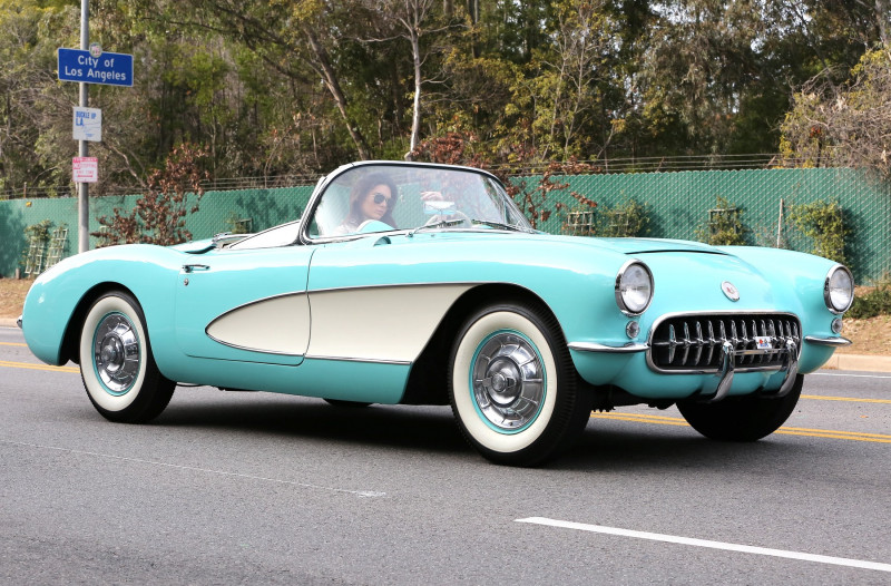 Kendall Jenner cruising around in her green Corvette