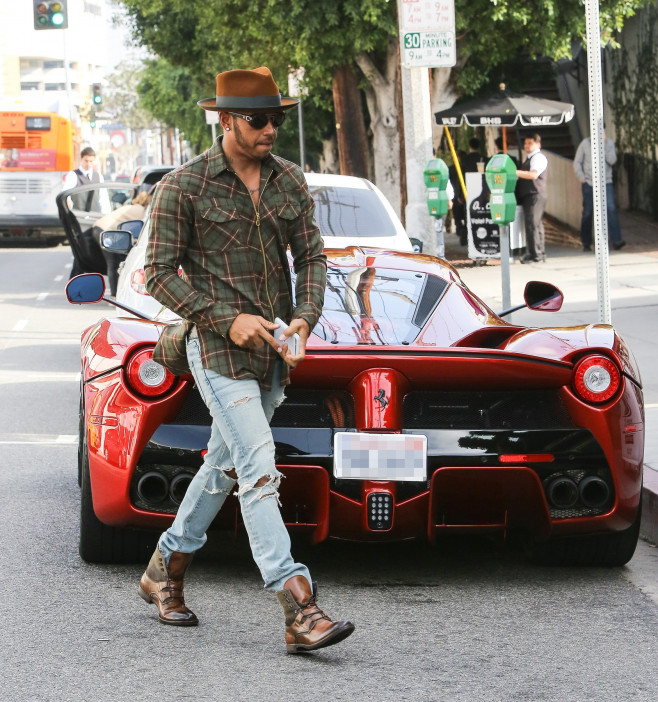 EXC: LEWIS HAMILTON DRIVES A BRAND NEW $1.5 MILLION FERRARI