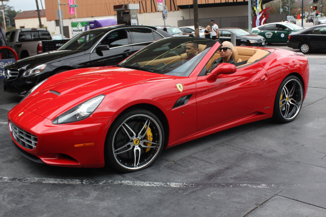 Amber Rose gets a flat on new Ferrari convertible