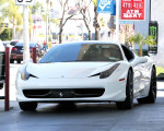Kim Kardashian gasses up her Ferrari