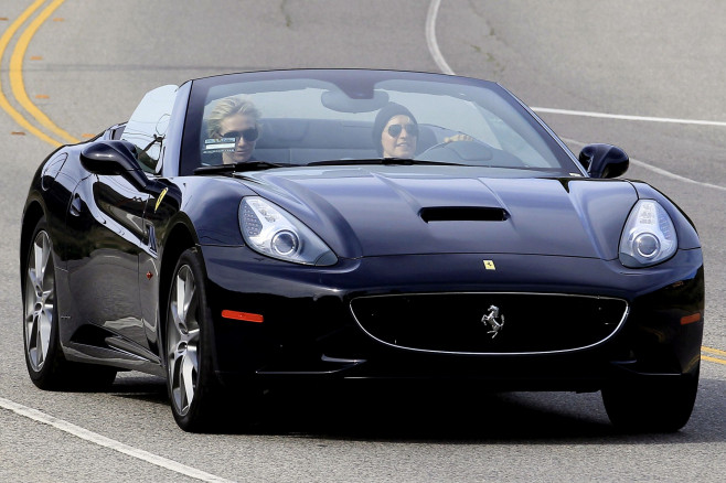 **EXCLUSIVE** NEW HOUSE, NEW CAR - Ellen DeGeneres takes Portia Di Rossi for a ride in her hot new Ferrari down PCH after purchasing Brad Pitt's Malibu mansion