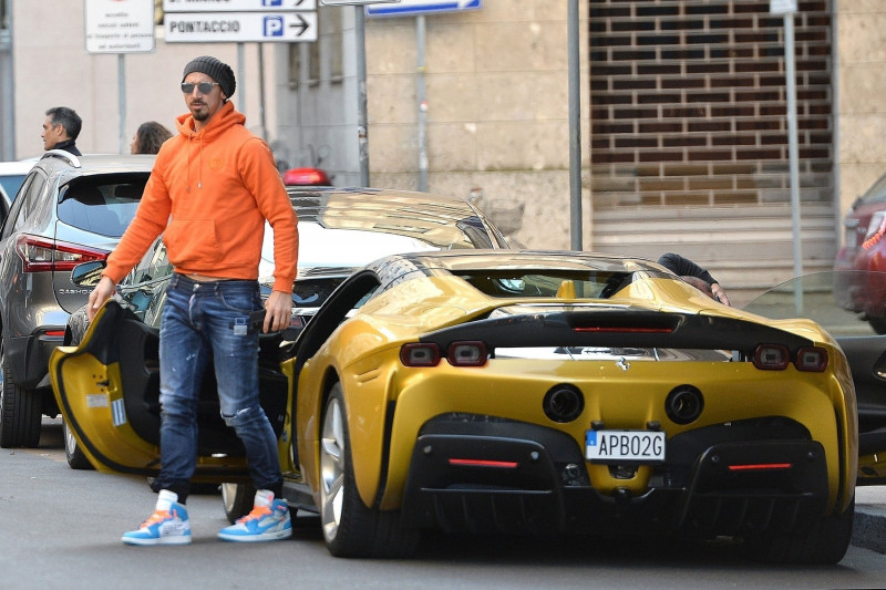 *EXCLUSIVE* The Maverick that is Zlatan Ibrahimovic is spotted looking casual and cool as he rocks up in his $500,000 Ferrari SF90 Stradale out in Milan.
