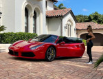 Larsa Pippen at the wheel of her gleaming new $320k Ferrari.