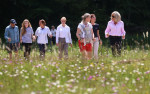 26 June 2022, Bavaria, Elmau: Christian Neureuther, former professional skier. (l-r), Carrie Johnson, wife of British Prime Minister Johnson, Britta Ernst, wife of German Chancellor Olaf Scholz (SPD), Miriam Neureuther, former biathlete, Amelie Derbaudren