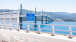 New Peljesac Bridge sign is seen at begining of Peljesac bridge in Komarna, Croatia on June 21, 2022. Peljesac bridge has passed a technical inspection and will be opened along with 20 kilometres of access roads in end of July this year. Photo: Milan Sabi