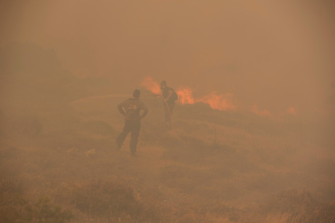 Massive wildfire burns part of Penteli mountain - Athens, Greece