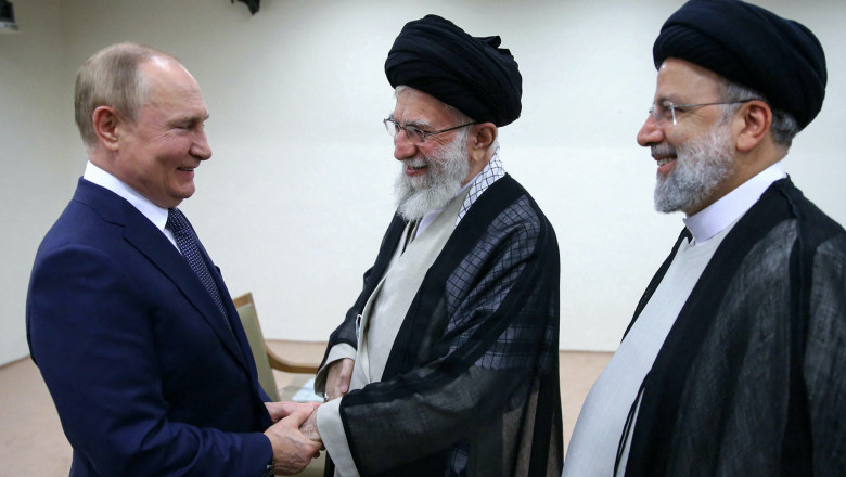 Ayatollah Ali Khamenei's office shows him (C) receiving Russian President Vladimir Putin in the presence of his Iranian counterpart Ebrahim Raisi in Tehran, on July 19, 2022
