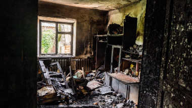 Woman Sits Inside A Building That Has Been Hit By A Rocket In Ukraine