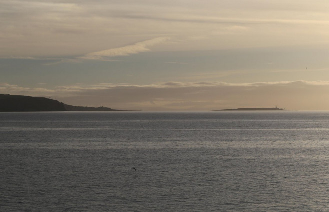 Island of Pladda with the cliffs of Bennan Head Isle of Arran Scotland September 2016