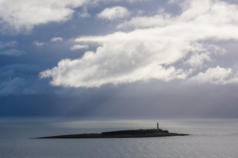 Dramatic clouds over Pladda island, off the south coast of Isle of Arran, North Ayrshire, Scotland