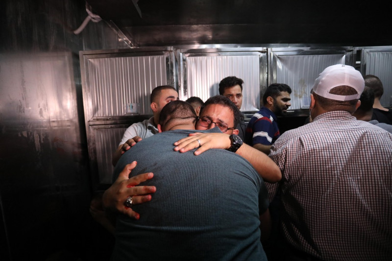 Palestinians mourn over the body of Tayseer al-Jabari, a commander in Saraya al-Quds, the military wing of Islamic Jihad, Gaza city, Gaza Strip, Palestinian Territory - 05 Aug 2022