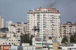 Smoke rises from a building following an Israeli air strike on Gaza City, Gaza city, Gaza Strip, Palestinian Territory - 05 Aug 2022