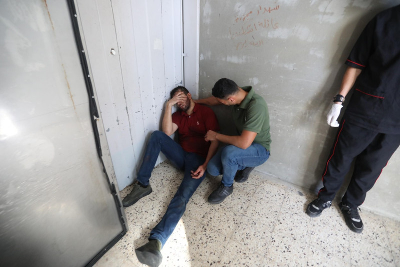 Palestinians mourn over the body of Tayseer al-Jabari, a commander in Saraya al-Quds, the military wing of Islamic Jihad, Gaza city, Gaza Strip, Palestinian Territory - 05 Aug 2022