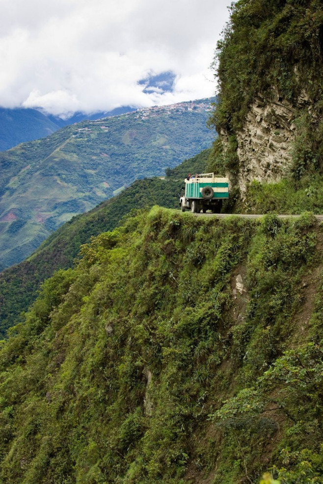 Vehicle traveling the road from La Paz to Coroico, Bolivia.