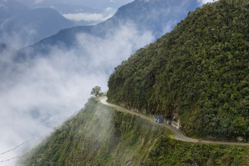 Vehicle traveling the road from La Paz to Coroico, Bolivia.