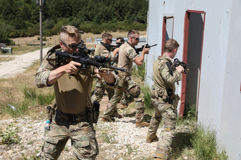 Soldiers with Charlie Company 1st Battalion 149th Infantry conduct military operations on urbanized terrain (MOUT) training near Mitrovica, Kosovo July 18, 2022. KFOR and its multinational partners are committed to maintaining a safe and secure environmen