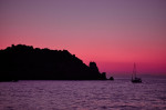 Purple light at dusk over the sea at Giglio Island, Tuscan Archipelago, Italy.