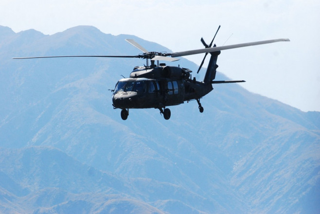 A UH-60L Black Hawk helicopter from A Company, 2nd Battalion (Assault), 10th Combat Aviation Brigade, Task Force Phoenix, flies