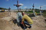 Burial of unidentified civilians who were killed by the Russian military in Bucha - 17 Aug 2022