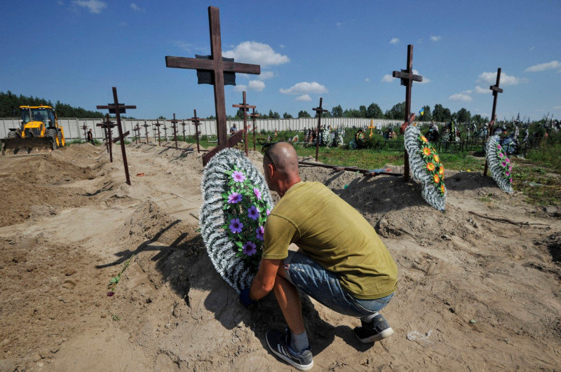 Burial of unidentified civilians who were killed by the Russian military in Bucha - 17 Aug 2022