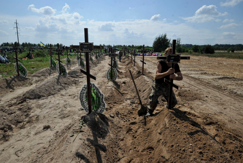 Burial of unidentified civilians who were killed by the Russian military in Bucha - 17 Aug 2022