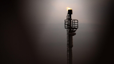 Rehden, Germany. 16th Aug, 2022. A small flame can be seen on a flare from the natural gas storage facility (Astora GmbH). This is the largest storage facility in Western Europe. Astora GmbH is also a subsidiary of the Russian energy company Gazprom Credi