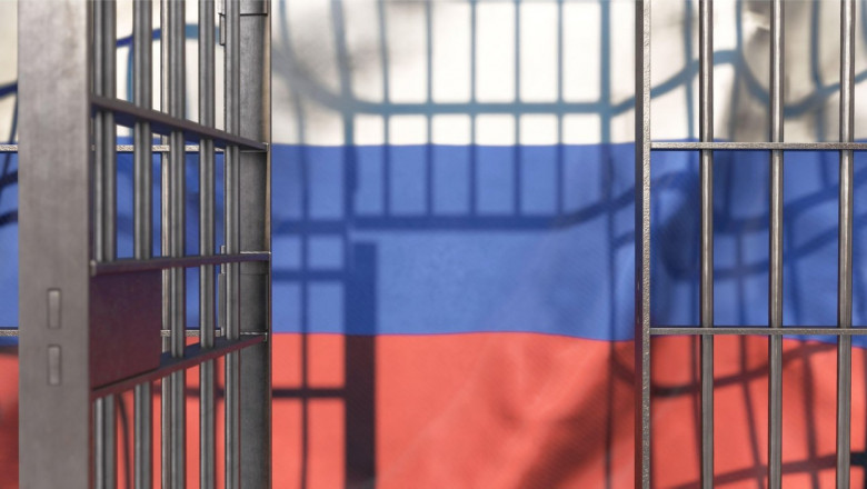 Gratii de celulă cu steagul Rusiei.