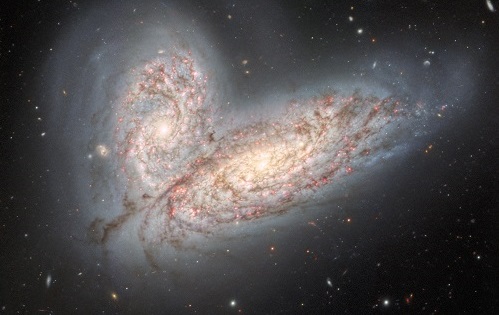 O imagine cu două galaxii care se ciocnesc arată ce soartă va avea Calea Lactee