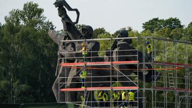 Workers demolish the monument to the Liberators of Soviet Latvia and Riga from the German Fascist Invaders at Victory Park in Riga, Latvia