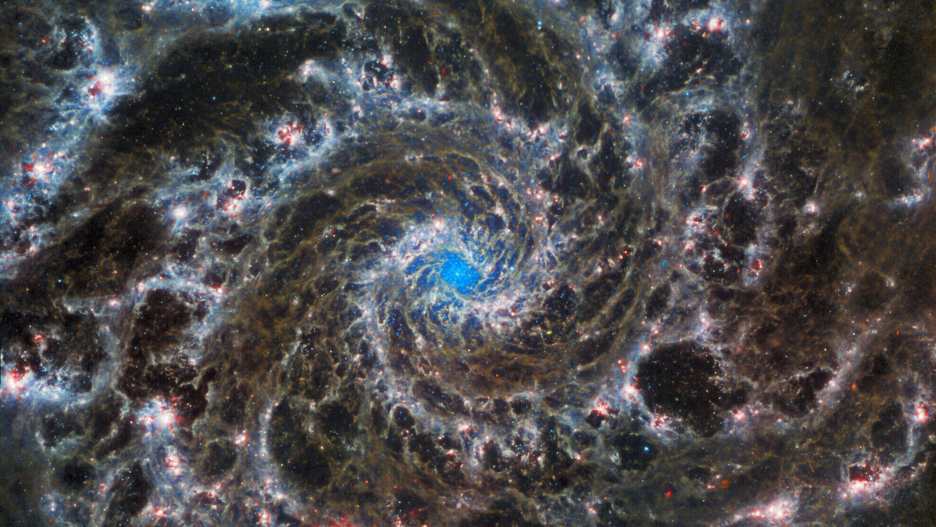 NASA a publicat o nouă imagine impresionantă cu Galaxia Fantomă. Fotografia, realizată cu date combinate de la Webb și Hubble