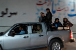 Luptători talibani într-o mașină papuc în Kabul