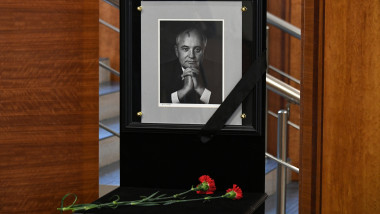 Flowers are placed next to a portrait of former Soviet President Mikhail Gorbachev at the International Foundation for Socio-Economic and Political Studies (Gorbachev Foundation) in Moscow